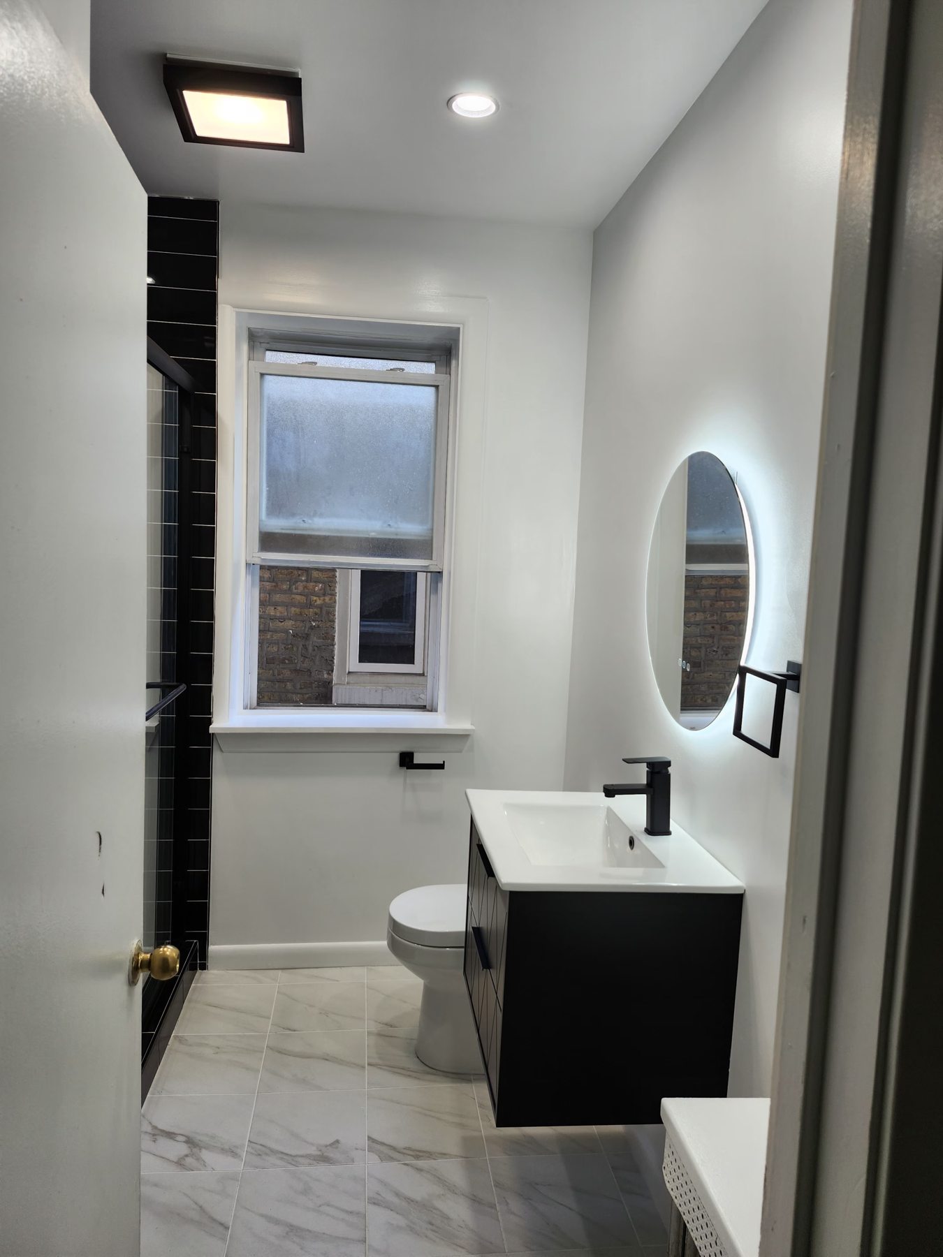 Bathroom lighting and finished vanity