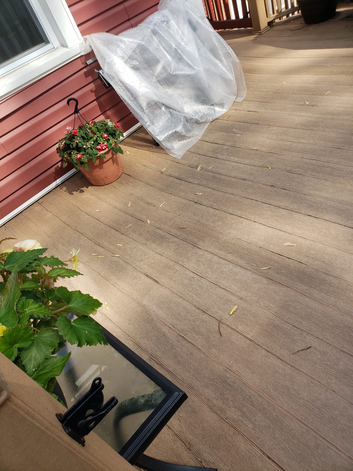 Wood decking beside the home