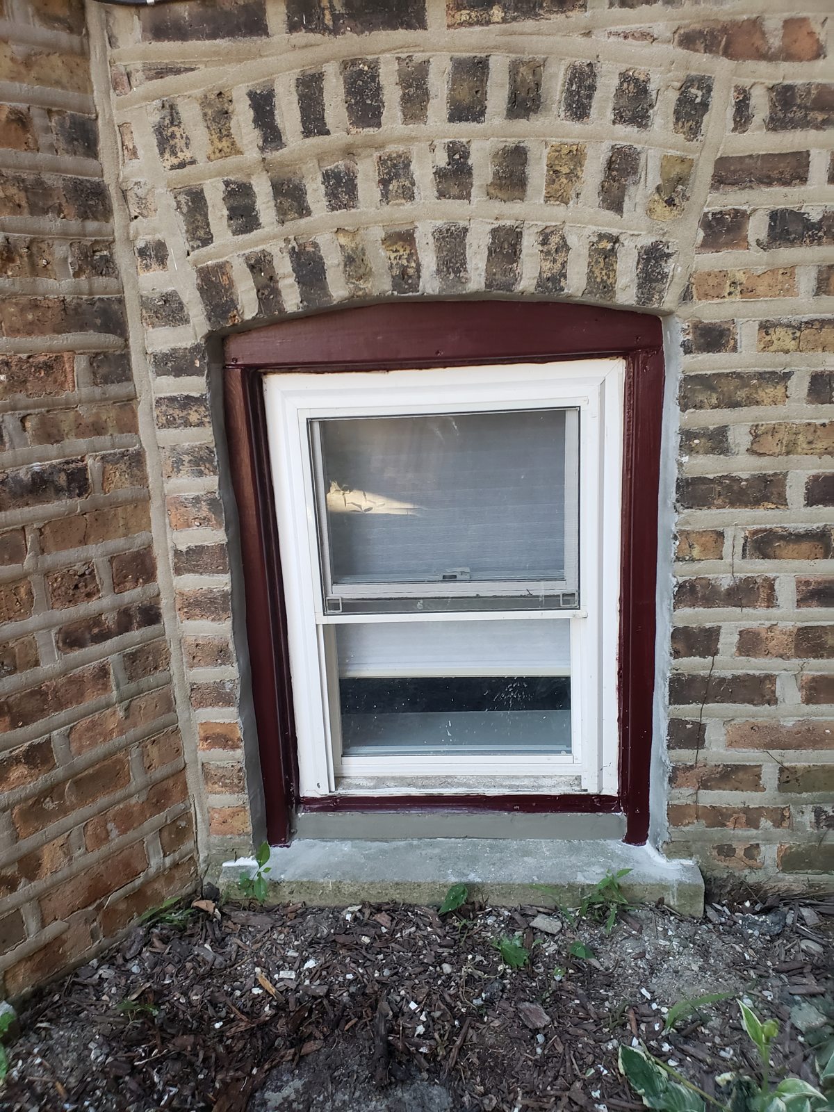 Installed window in brick exterior